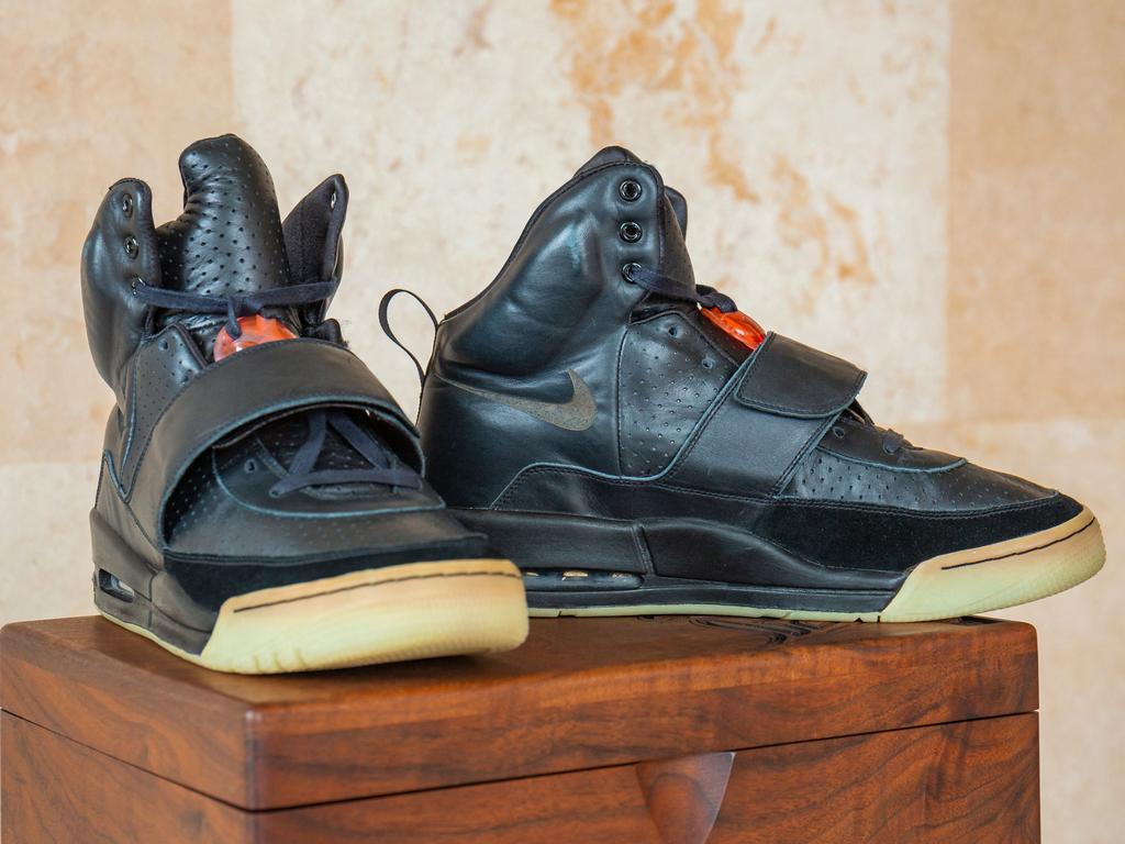 This handout photo courtesy of Sothebyâs shows the black high-top Yeezys worn by rapper Kanye West during the 2008 Grammy Awards. - A pair of Nike Air Yeezy 1s worn by rapper Kanye West sold for $1.8 million, triple the previous record for sneakers, Sotheby's said April 26, 2021, as the market for rare sports shoes soars. (Photo by Handout / SOTHEBY'S / AFP) / RESTRICTED TO EDITORIAL USE - MANDATORY CREDIT "AFP PHOTO / Courtesy Sothebyâs" - NO MARKETING - NO ADVERTISING CAMPAIGNS - DISTRIBUTED AS A SERVICE TO CLIENTS