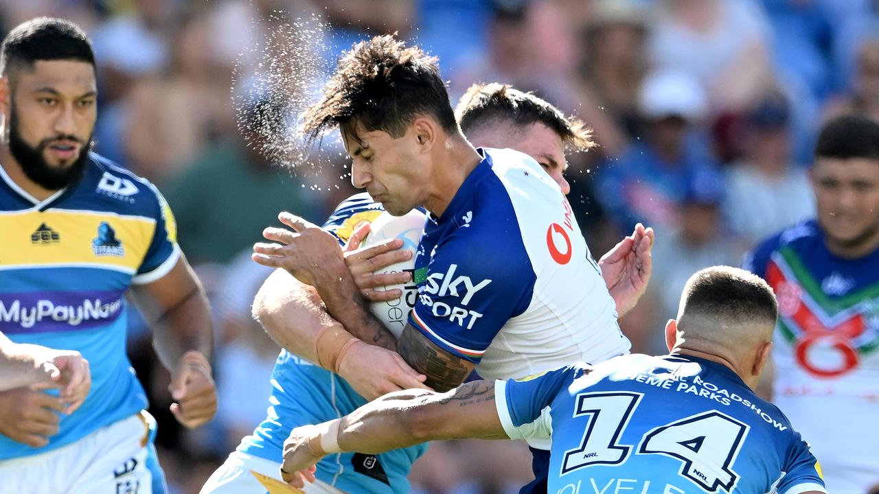 GOLD COAST, AUSTRALIA - MARCH 19: Jesse Arthars of the Warriors takes on the defence during the round two NRL match between the Gold Coast Titans and the New Zealand Warriors at Cbus Super Stadium, on March 19, 2022, in Gold Coast, Australia. (Photo by Bradley Kanaris/Getty Images)