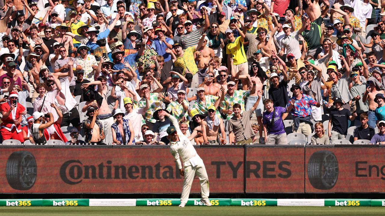 Travis Head cemented himself as a fan favourite after crucial centuries in the World Test Final and World Cup Final in 2023, and imitated the great Merv Hughes in front of Bay 13 in the Boxing Day Test. Picture: Robert Cianflone/Getty Images.