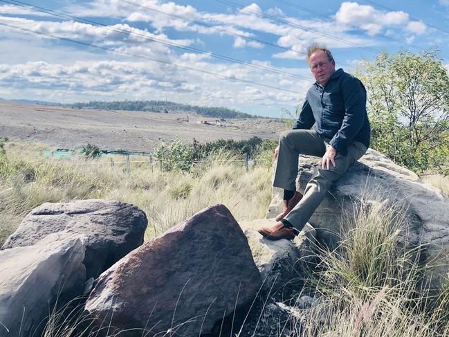 Geoff Yarham at the site of a waste dump at New Chum, Ipswich