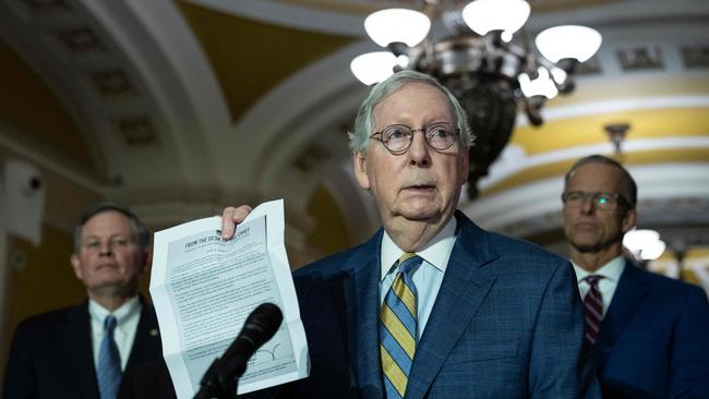 Mitch McConnell holds up a letter from the US Capitol Police as he denounces Tucker Carlson's coverage of the January 6, 2021 attack. Picture: AFP