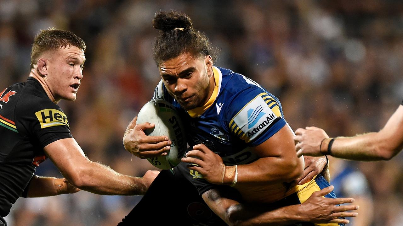 Isaiah Papali'i of the Eels is tackled during the NRL semi-final played in Mackay.