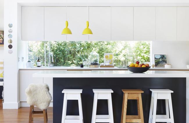 Mark Tuckey angel leg stools in the kitchen. Picture: Zan Wimberley