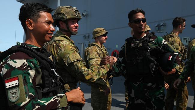 Australian Defence Force and Indonesian National Armed Forces members aboard the HMAS Adelaide ahead of Exercise Keris Woomera. Picture: Zizi Averill