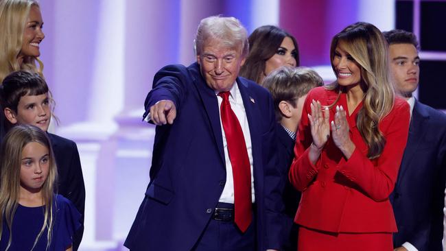 Former first lady Melania Trump and members of the Trump family join Republican presidential nominee Donald Trump on stage after he officially accepted the Republican presidential nomination at the Republican National Convention. Picture: Chip Somodevilla/Getty Images/AFP