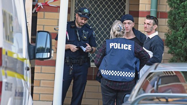 Police speaking to residents on Sturt Street on Tuesday evening after a man’s body was found. Picture: Tom Huntley