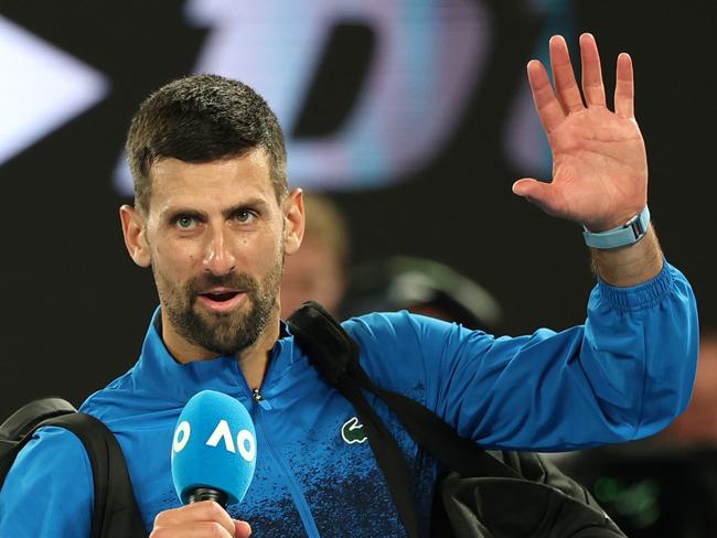 MELBOURNE, AUSTRALIA - JANUARY 19: Novak Djokovic of Serbia speaks to the crowd following victory against Jiri Lehecka of the Czech Republic in the Men's Singles Fourth Round match during day eight of the 2025 Australian Open at Melbourne Park on January 19, 2025 in Melbourne, Australia. (Photo by Cameron Spencer/Getty Images)