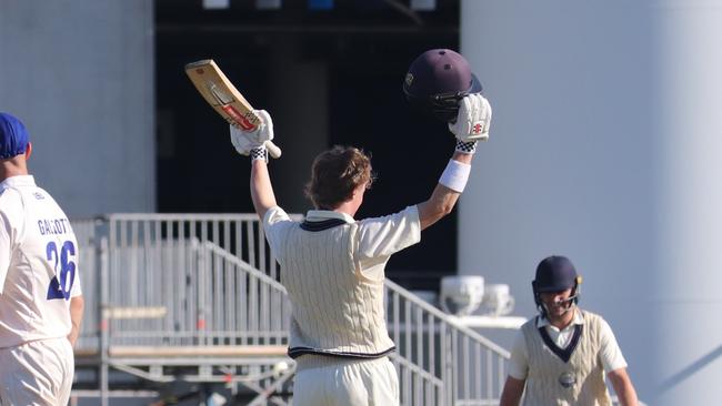 Oliver Peake brings up his hundred against Greenvale Kangaroos. Picture: Carey Neate.