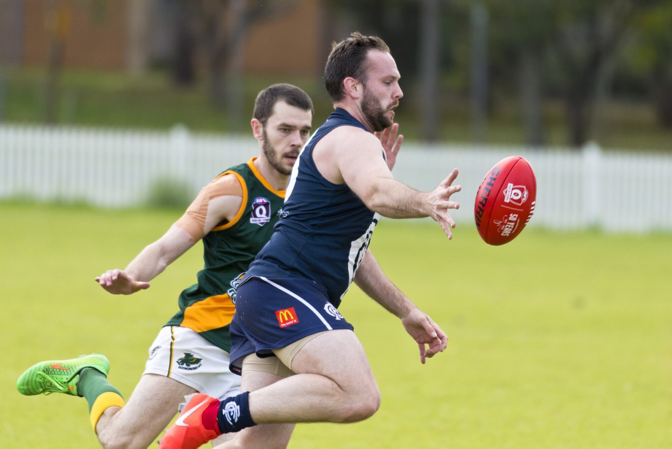 Coolaroo player Carl Stevenson attempts to keep the ball from Goondiwindi in AFL Darling Downs round one at Rockville Oval, Saturday, July 11, 2020. Picture: Kevin Farmer