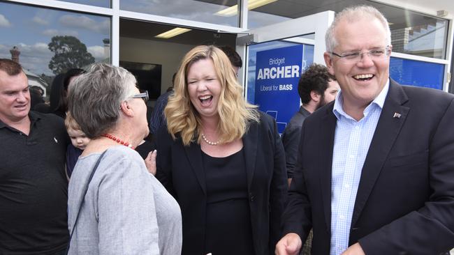 Prime Minister Scott Morrison (right) and Liberal candidate for Bass Bridget Archer greet Liberal supporters at the opening of the party’s Bass campaign office in Launceston, Tasmania in February. Picture: AAP/SARAH RHODES