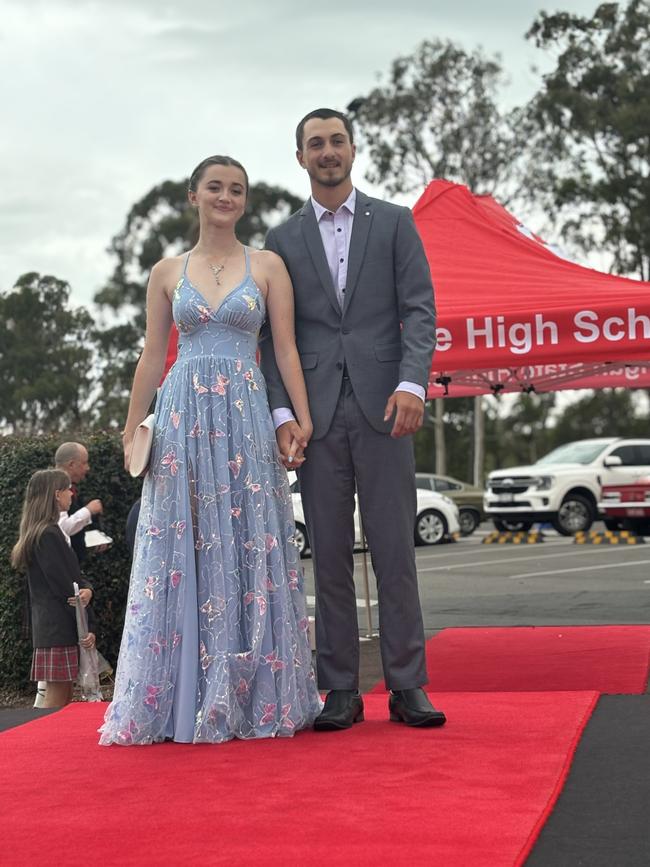 The students of Urangan State High School arriving at their formal.