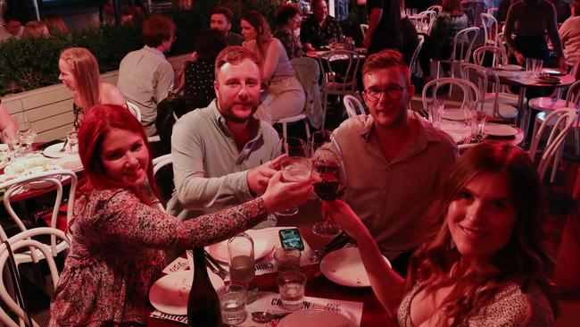 People cheers to the New Year on Flinders Lane. Picture: David Crosling