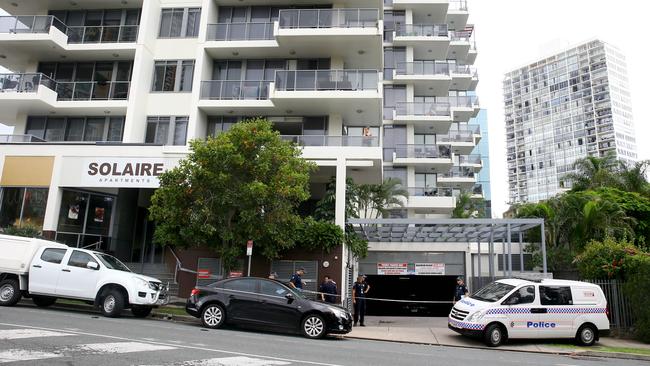Forensic crime scene police on the scene of a police involved overnight shooting in the underground carpark of the Solaire Apartments on the corner of Ferny Avenue and Cypress Avenue, Surfers Paradise Photo: David Clark