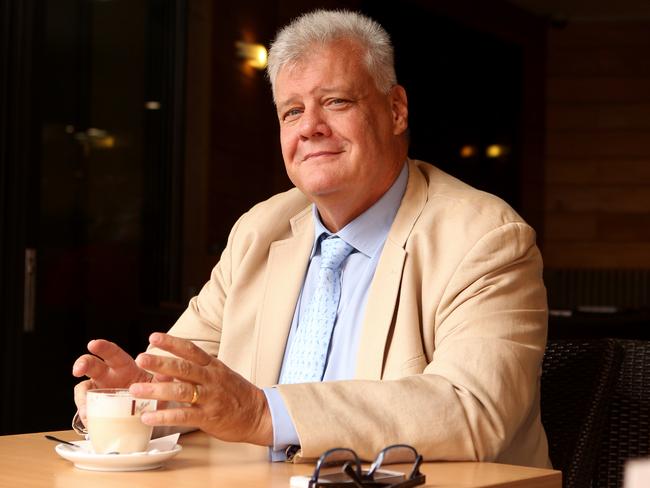 Daily Telegraph. Big Jim Byrnes is pictured at a cafe in Double Bay today.