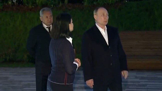 Vladimir Putin's right arm looks limp in amid health fears