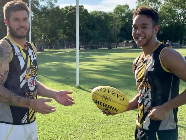 Nightcliff youngster Michael Hagan (right) with captain Nathan Brown. Picture: NATHANIEL CHAMBERS