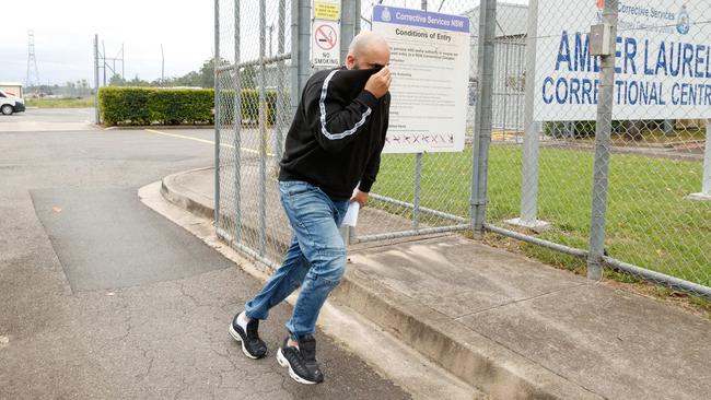 Sam Haddad running from reporters as he leaves Amber Laurel Correctional Centre in Emu Plains. Picture: Max Mason-Hubers