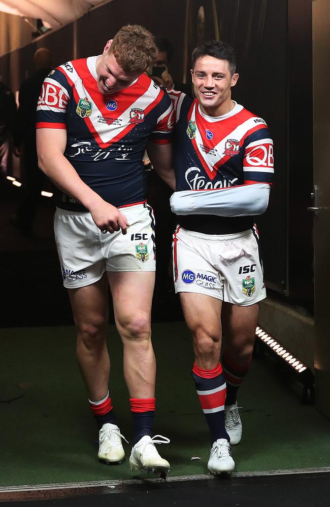 Dylan Napa and Cooper Cronk after last year’s grand final. Picture: Brett Costello