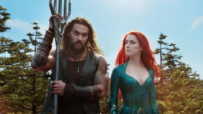 Jason Momoa and Amber Heard in a scene from the movie Aquaman. Picture: Warner Bros.