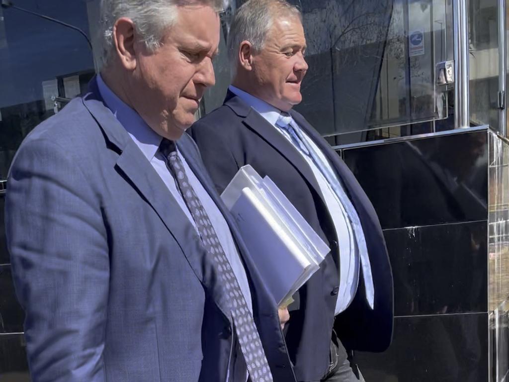 Solicitor Ian Dempster and Paul Jeffrey Hansen outside Toowoomba Magistrates Court.