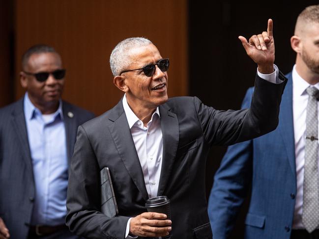 This morning, Barack Obama waved to well-wishers with a ‘shaka’ wave. Picture: Julian Andrews