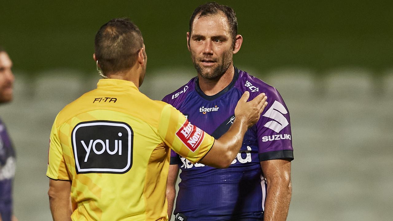 Cameron Smith of the Storm speaks to the referee.