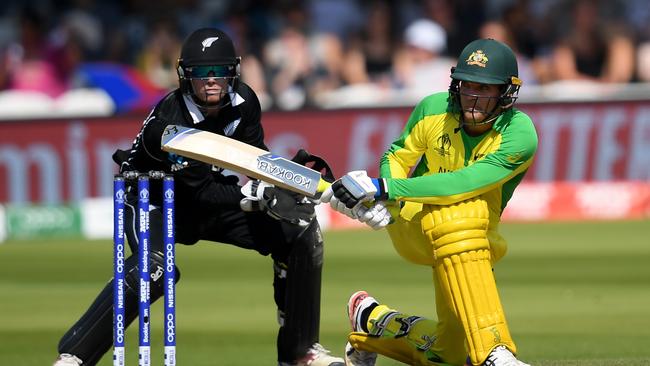 Alex Carey sweeps on his way to a 71-run knock for Australia against New Zealand in their ICC Cricket World Cup 2019 match at Lord’s on June 29. Picture: Alex Davidson/Getty Images