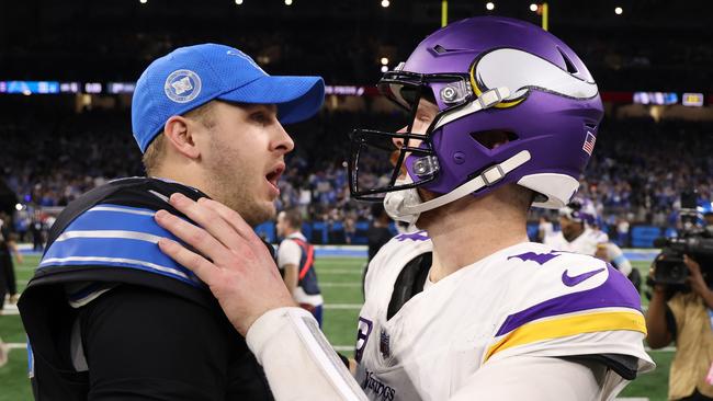 DETROIT, MICHIGAN - JANUARY 05: Jared Goff #16 of the Detroit Lions speaks with Sam Darnold #14 of the Minnesota Vikings after the game at Ford Field on January 05, 2025 in Detroit, Michigan. (Photo by Gregory Shamus/Getty Images)