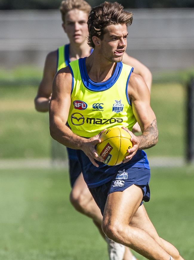 Jy Simpkin looks to move the ball in a running duel. Picture: Jake Nowakowski