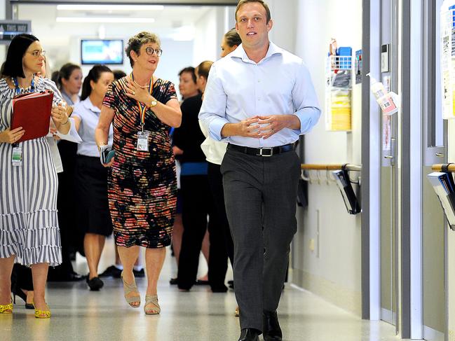 Health Minister Steven Miles walks around the Gold Coast University Hospital to meet with Gold Coast nurses trialling a new program that allows nurses to spend more time with patients.Tuesday November 20, 2018. (AAP image, John Gass)