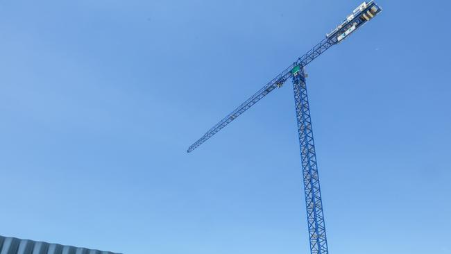 The first of two tower cranes erected at CDU’s CBD campus. Picture: Glenn Campbell