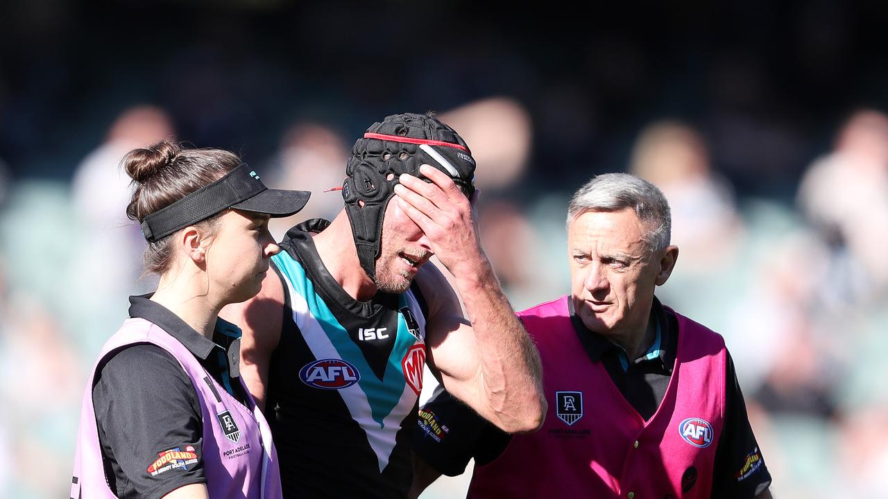 Port Adelaide's Brad Ebert was badly unjured duing a clash with Sydney last year, despite head-protection gear. Picture: Sarah Reed