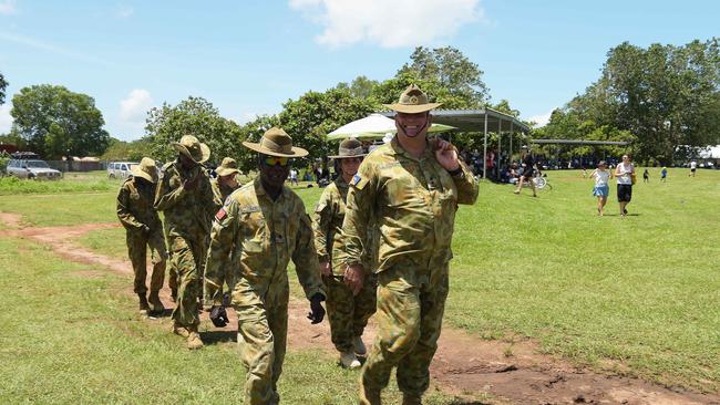 Norforce are seen walking through grounds on Tiwi Islands. Picture: Keri Megelus