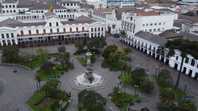 Aerial view of the empty Plaza Grande square, with Carondelet presidential palace in the background, in Quito, on March 19, 2020. – Ecuador decreed state of emergency restricting the circulation of people against the spread of the new coronavirus. Picture: Rodrigo Buendia.