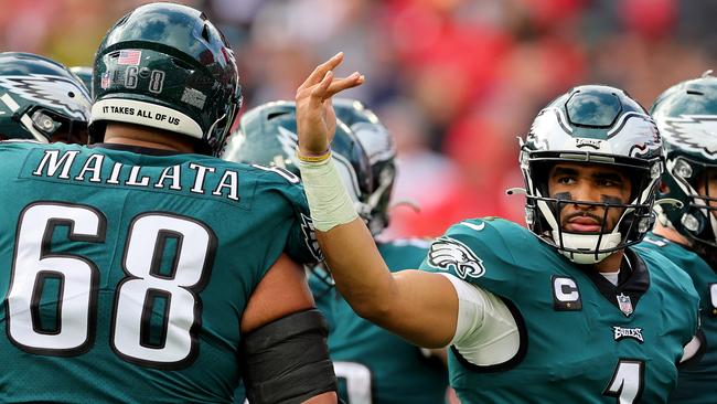 The season is over for Mailata (L), Hurts (R) and the Eagles. (Photo by Michael Reaves/Getty Images)