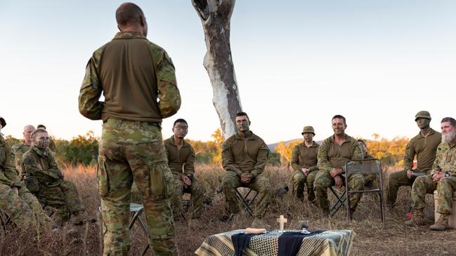 Australian Army Chaplin, Major Gary Pope from the 3rd Brigade Headquarters, delivers a field service to soldiers at Townsville Field Training Area, Queensland on Exercise Talisman Sabre, 25 July 2021.