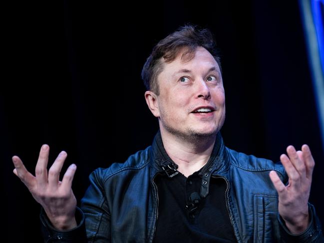 (FILES) In this file photo Elon Musk, founder of SpaceX, speaks during the Satellite 2020 at the Washington Convention Center on March 9, 2020, in Washington, DC. - President Donald Trump sided with Tesla on May 12, 2020, calling for California authorities to allow the reopening of the electric carmaker's assembly plant after company chief Elon Musk said he was defying local authorities. Trump's comments came a day after Musk said he was restarting production at the plant in Fremont, California and after a series of angry tirades against the state's lockdown policies to contain the coronavirus pandemic. (Photo by Brendan Smialowski / AFP)