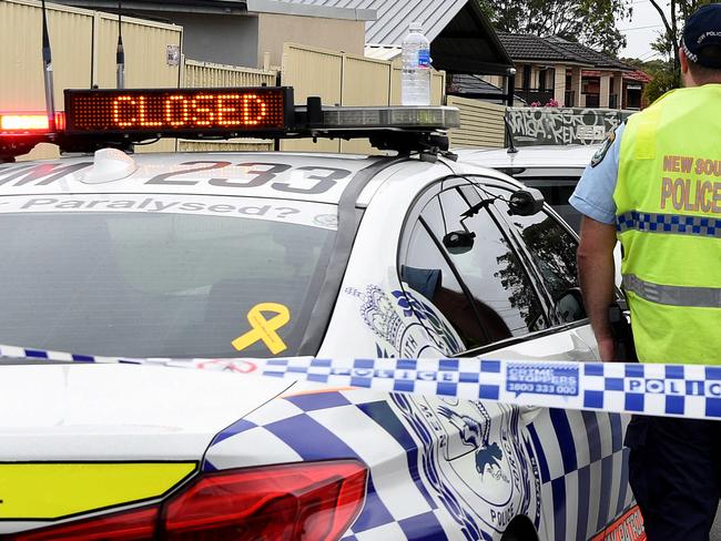 SYDNEY, AUSTRALIA - NewsWire Photos FEBRUARY, 23, 2021: Members of the Crash Investigation Unit and NSW Police are seen at the scene of a fatal crash in Chester Hill, Sydney. A female pedestrian has died at the scene after being hit by a garbage truck early this morning on Woodland Rd, Chester Hill. NCA NewsWire/Bianca De Marchi