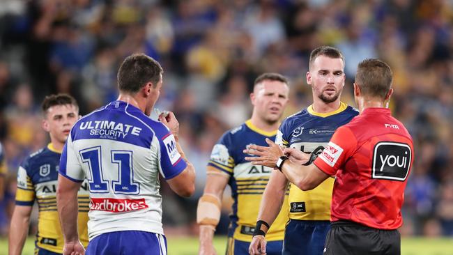 SYDNEY, AUSTRALIA - MARCH 12: Captains Josh Jackson of the Bulldogs and Clinton Gutherson of the Eels speak to the referee after the first captains challenge during the round 1 NRL match between the Parramatta Eels and the Canterbury Bulldogs at Bankwest Stadium on March 12, 2020 in Sydney, Australia. (Photo by Matt King/Getty Images)