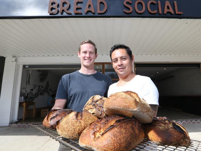 Popular bakery the Bread Social at Tweed Heads is expanding to the space next door. Owners Thomas Scott and Sam Saulwick at work. Picture Glenn Hampson