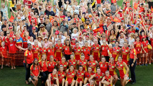 GOLD COAST, AUSTRALIA - FEBRUARY 15: Suns pose for a photo with fans during the round 2 AFLW match between the Gold Coast Suns and the Richmond Tigers at Metricon Stadium on February 15, 2020 in Gold Coast, Australia. (Photo by Chris Hyde/AFL Photos/Getty Images)