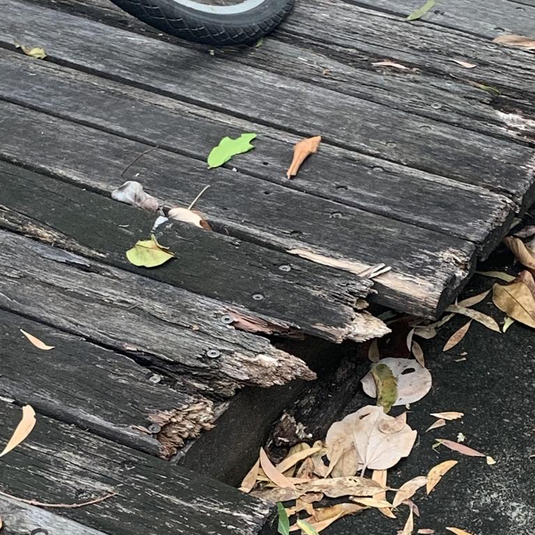 Rotting wood on the boardwalk at Couran Cove. Picture: Melanie Whiting