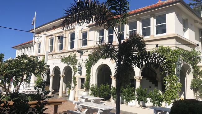 Views of the historic heritage-listed Manly Pavilion are blocked by the former Sea Life Aquarium building in Manly Cove. Picture: Manly Cove