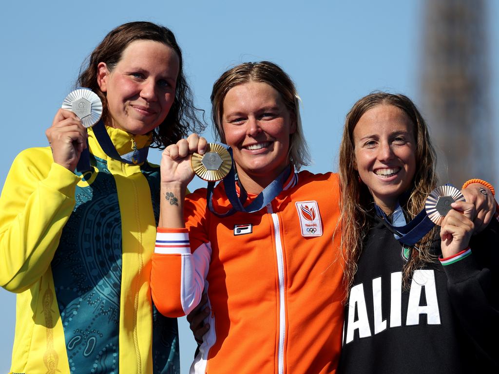 Gold medallist Sharon van Rouwendaal of Team Netherlands, centre, silver medallist Moesha Johnson of Team Australia, left, and bronze medallist Ginevra Taddeucci of Team Italy, right, pose on the podium. Picture: Clive Rose/Getty Images