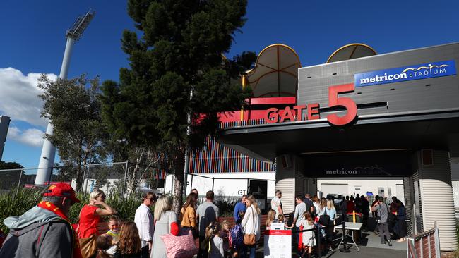 Crowds arrive for the round 3 AFL match between the Gold Coast Suns and the Adelaide Crows at Metricon Stadium. (Photo by Chris Hyde/Getty Images)