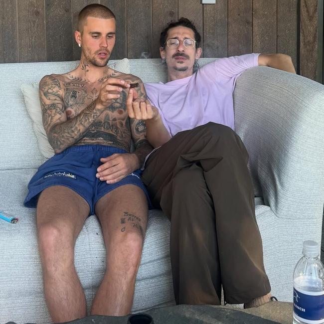 Another pic showed Bieber seemingly smoking weed on the same couch in the same outfit.
