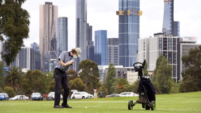 Golfers are waiting to find out when Melbourne’s courses can reopen. Picture: William WEST / AFP