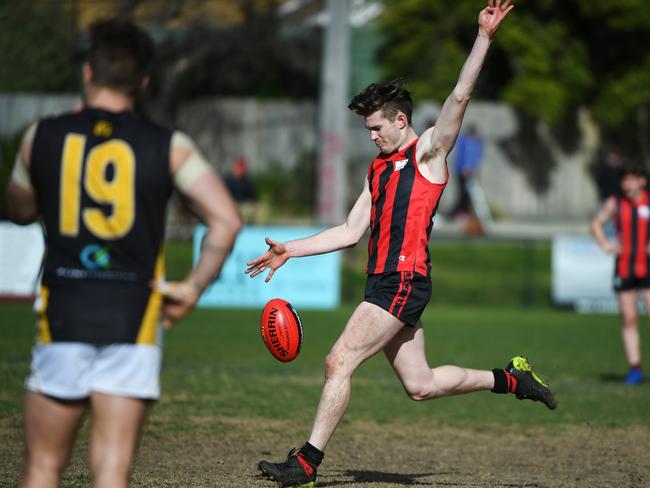 Marcus Young has a shot at goal. Picture: James Ross/AAP