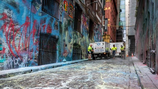 Splattered paint was also left over the cobblestones. Picture: Jake Nowakowski