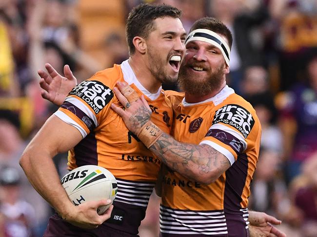 Corey Oates of the Broncos reacts after scoring a try during the Round 25 NRL match between the Brisbane Broncos and the Manly-Warringah Sea Eagles at Suncorp Stadium in Brisbane, Sunday, September 2, 2018. (AAP Image/Dave Hunt) NO ARCHIVING, EDITORIAL USE ONLY